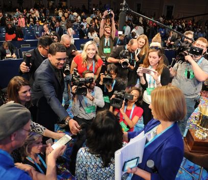 Members of the media interviewing the Scripps National Spelling Bee Champion